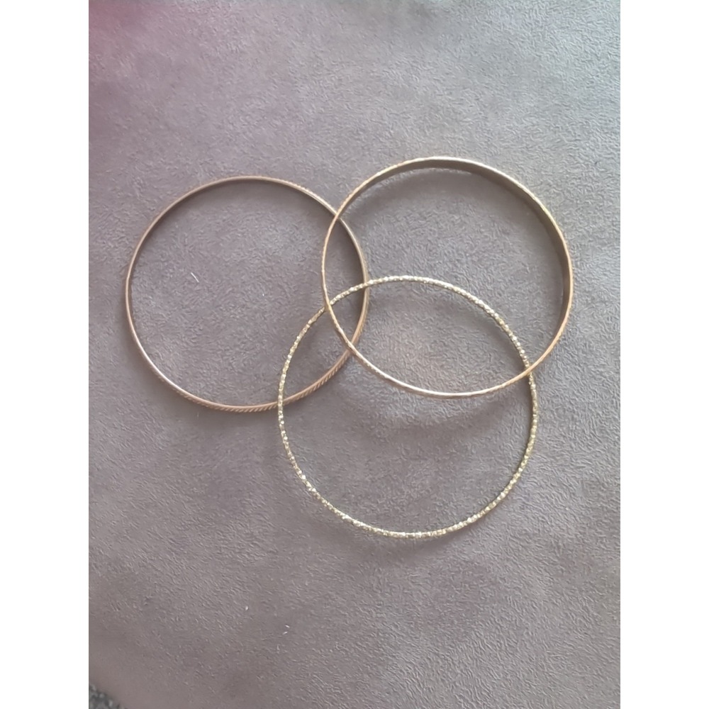 Set Of‎ 3 Bracelets With Gold Tones And Leaf Designs On Bands